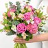 A full view of the Garden Bouquet containing; sweet scented stock, together with delicate alstroemeria and pretty pink roses.