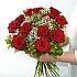 The elegant arrangement of 12 red roses with gypsophila.