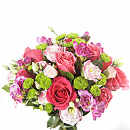 Summer Blush - A charming bouquet encompassing pretty pink roses, light lime green santini, coral pink eustoma and fragrant pink freesia.