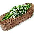 Oriental Lily Casket Spray - A simple family casket spray of scented oriental white lilies. 
