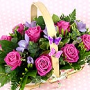 Garden Basket, an arrangement of freesia and pink roses