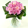 Grace - Pink Roses, a favourite with every lady; Twenty sweet pink roses perfectly arranged in a hand tied bouquet, finished off with luscious green aspidistra leaves.