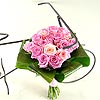 Grace - Pink Roses, a favourite with every lady; Twenty sweet pink roses perfectly arranged in a hand tied bouquet, finished off with luscious green aspidistra leaves.