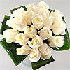 Innocence - the meaning of pure white roses, twenty crisp fresh roses hand tied and perfectly presented.