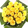 Twenty stems of Friendship - yellow roses and lush green aspidistra leaves, bringing warm sunny feelings of happiness!