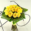 Twenty stems of Friendship - yellow roses and lush green aspidistra leaves, bringing warm sunny feelings of happiness!