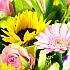 The Sunburst bouquet, including roses, germini and lilies amongst many other summery flowers.