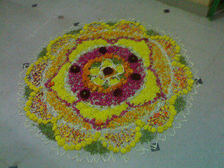 A rangoli made from flower petals